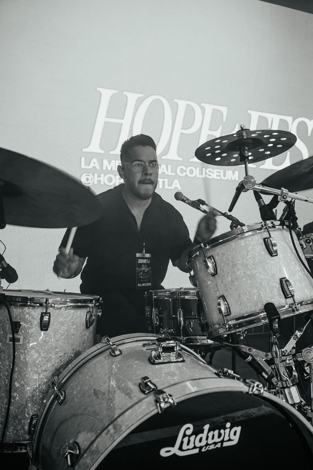 Black-and-white portrait of Kevin Michael Chong performing at Hopefest 2026