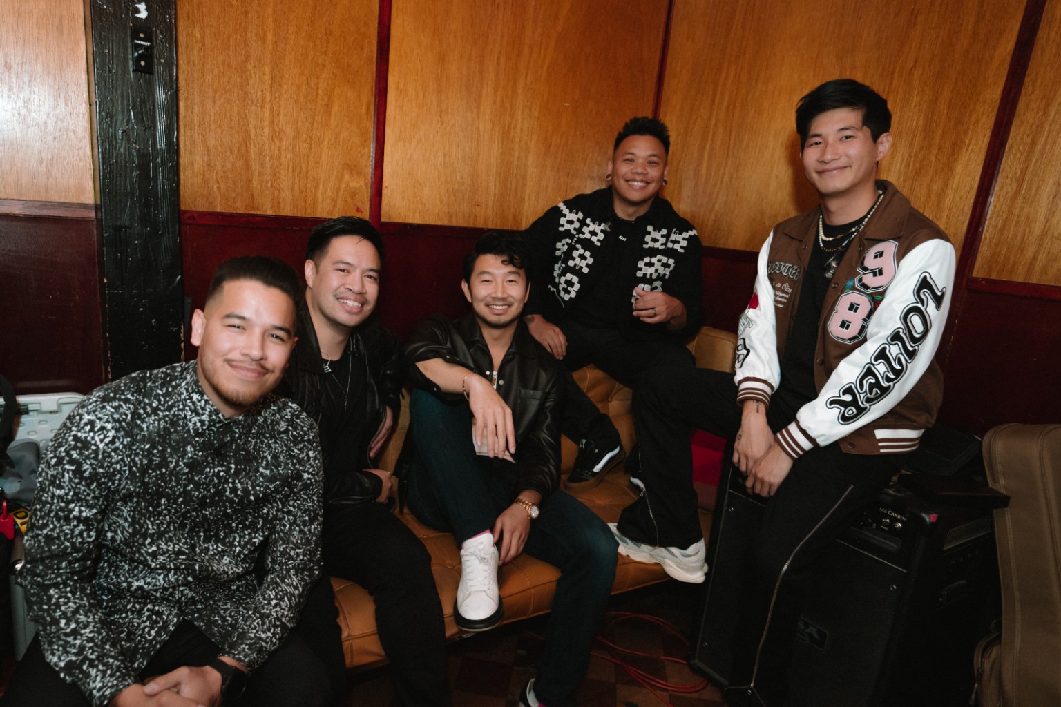 Kevin Michael Chong with Simu Liu and the band backstage at Hotel Café